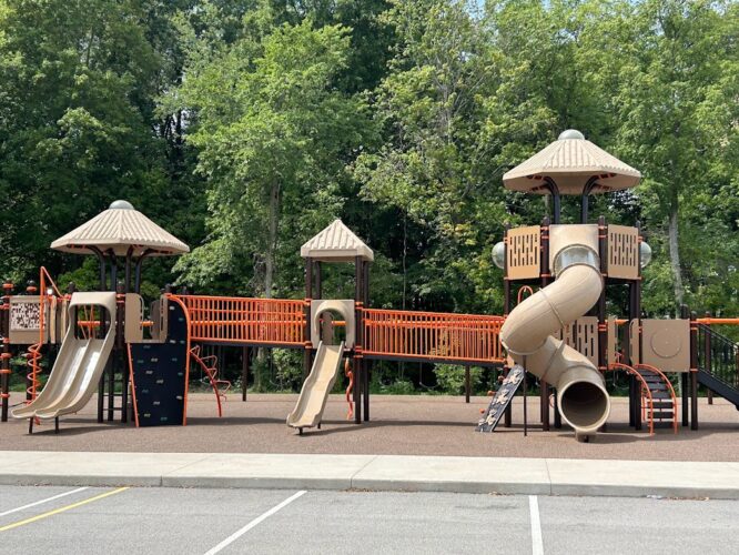 3 slides on the playground equipment