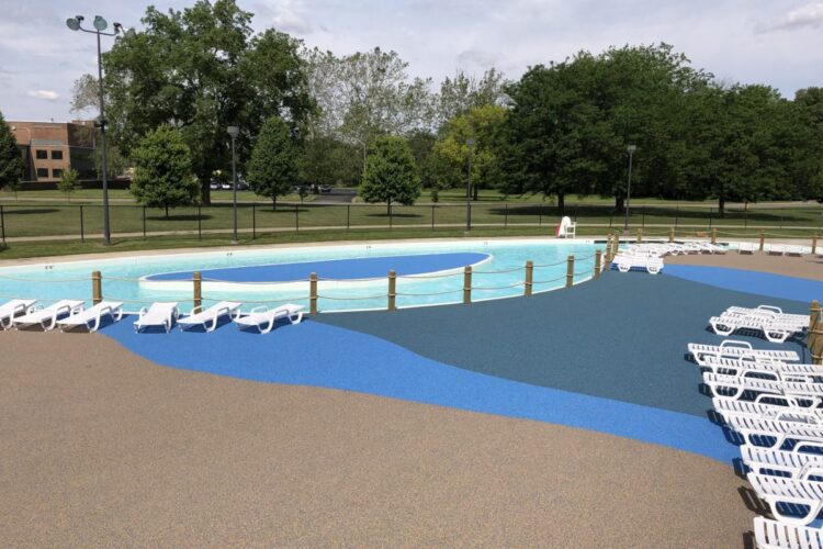 tri colored surface area around pool