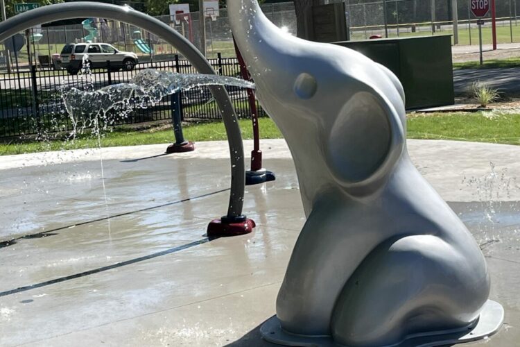 elephant structure spaying water