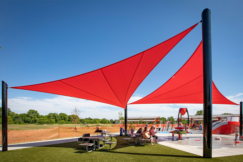 Red shade at splash pad