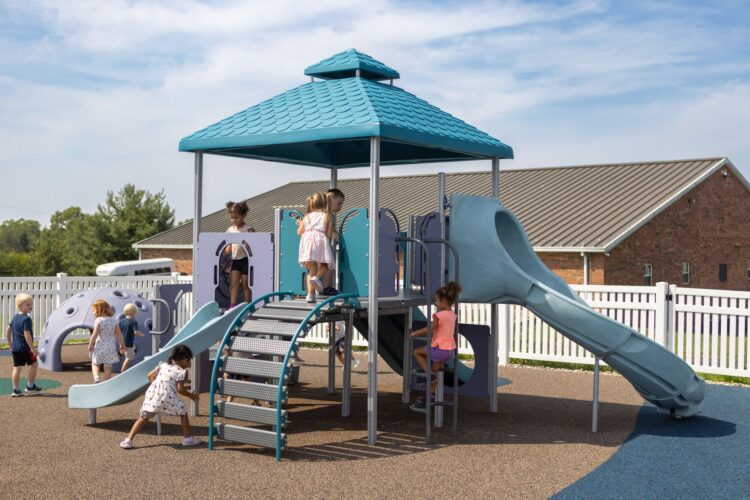 kids playing on slide and climbing wall