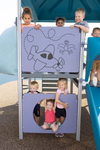 kids smiling from top of slide tower and from tunnel below