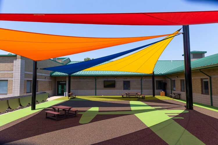 4 shades providing cover over courtyard