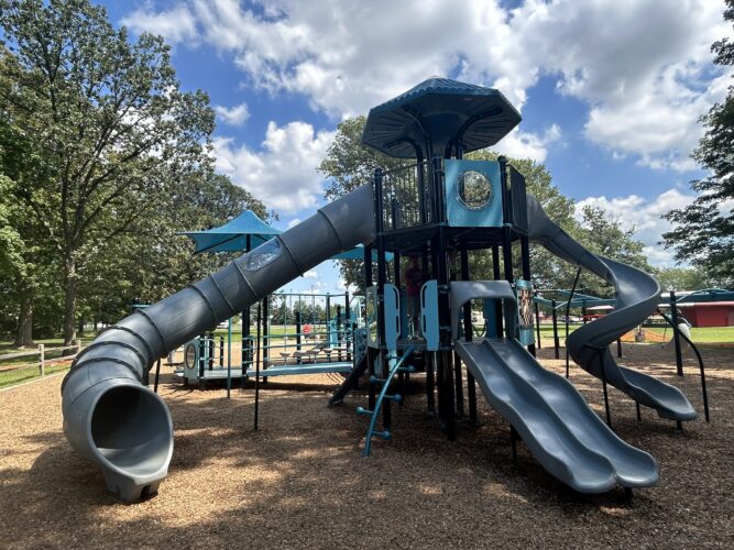 PlayOdyssey™ tower with tunnel slide, WhooshWinder™ slide, and double wave slide