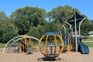 free standing play structures include a Crab Trap™, and a rotating climber for ages 5-12. a 2-5 structure is also included