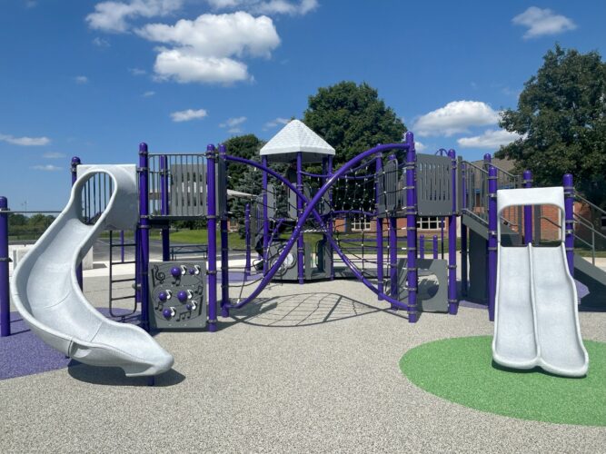 purple and gray play structures with winding slide and twisty climber