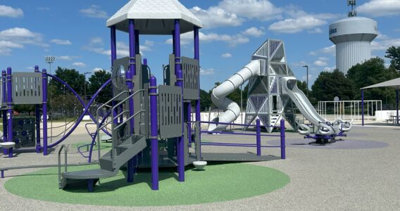 2 silver and purple play structures for kids aged 5-12