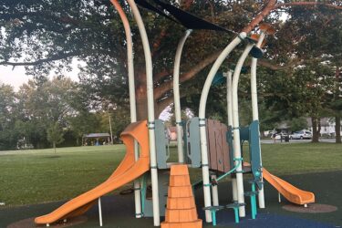 orange and blue play structure for kids aged 2-15