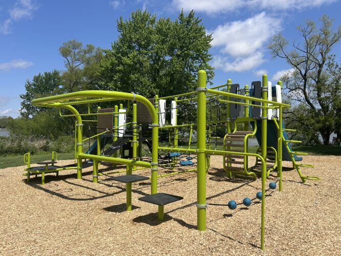 play structure for 5-12 year old kids with walking and climbing ropes and monkey bars