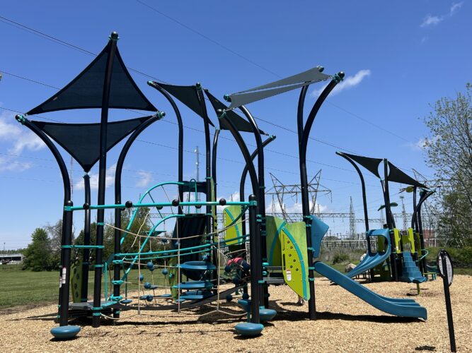 5-12 play structures with integrated shade, slide, ropes, and monkey bars