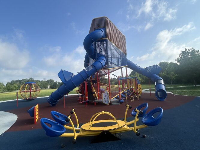 large 3 story play structure, 4-person see-saw, and spinning climber