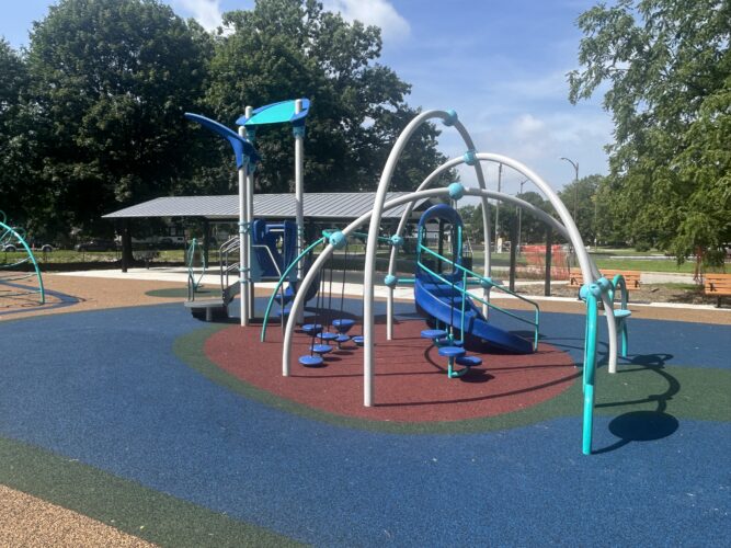 blue, turquois, and gray play structure for 2-5 year olds with safety surfacing
