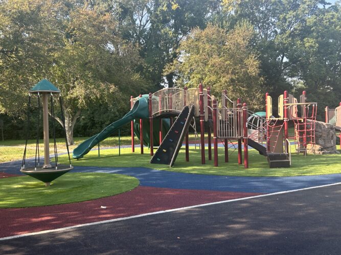 red, green, and brown play structure for kids ages 5-12