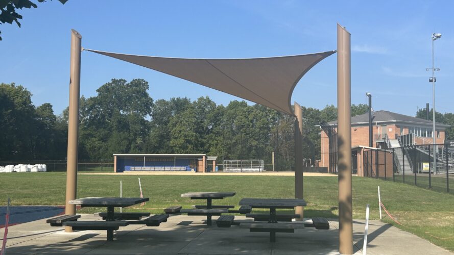 four post brown fabric shade structure