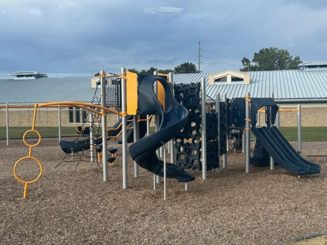 blue curly slide, 2 blue connected slides, and climbing panels